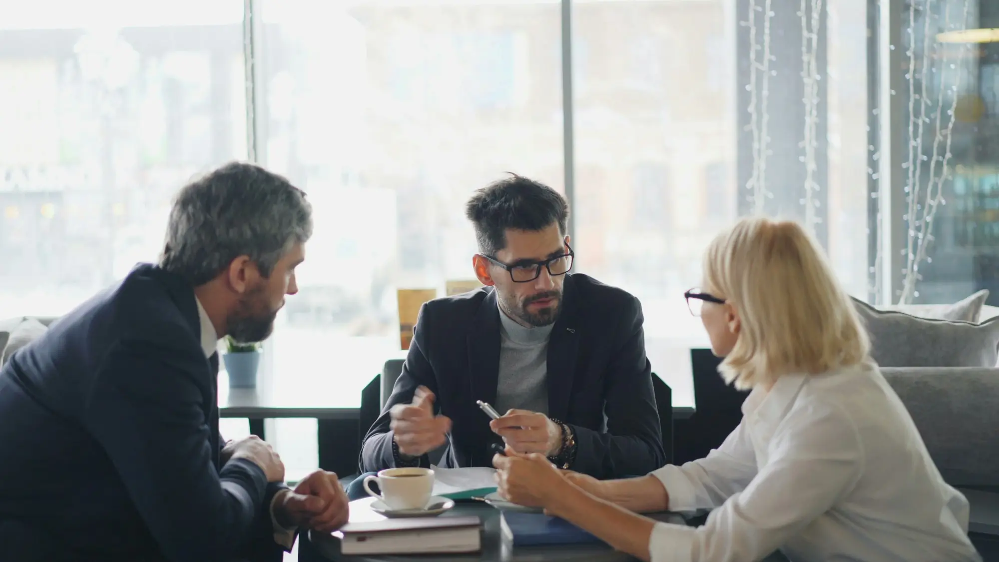 Accountant explaining loan costs client