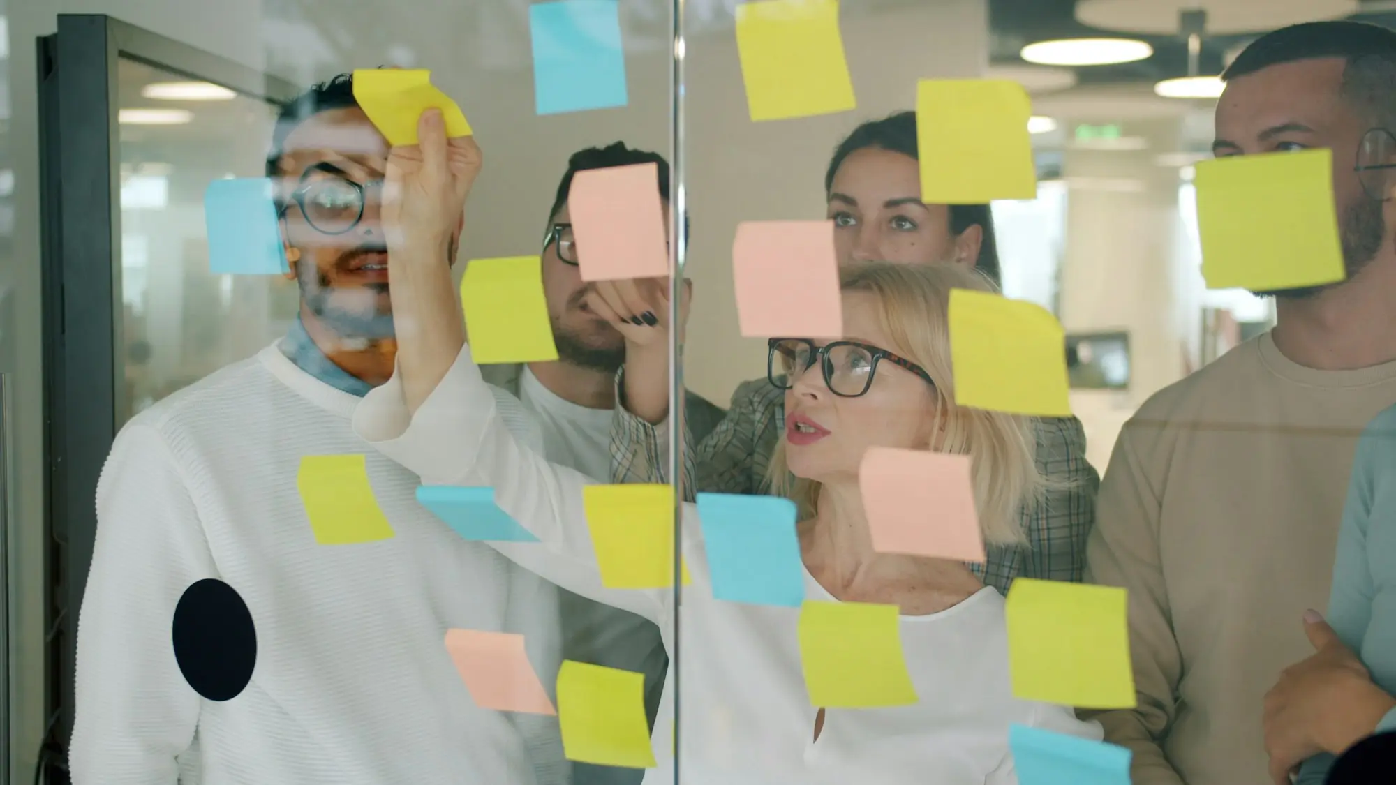Business plan founders planning at whiteboard