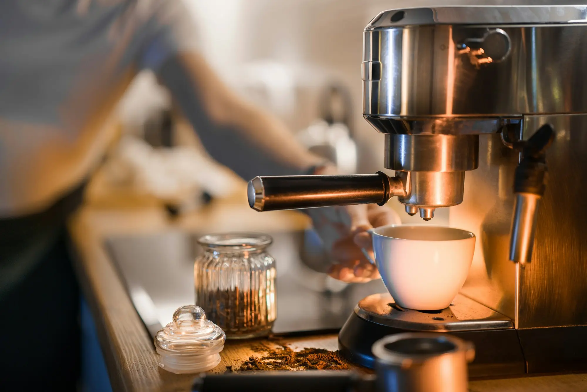 Cafe owner espresso bar morning