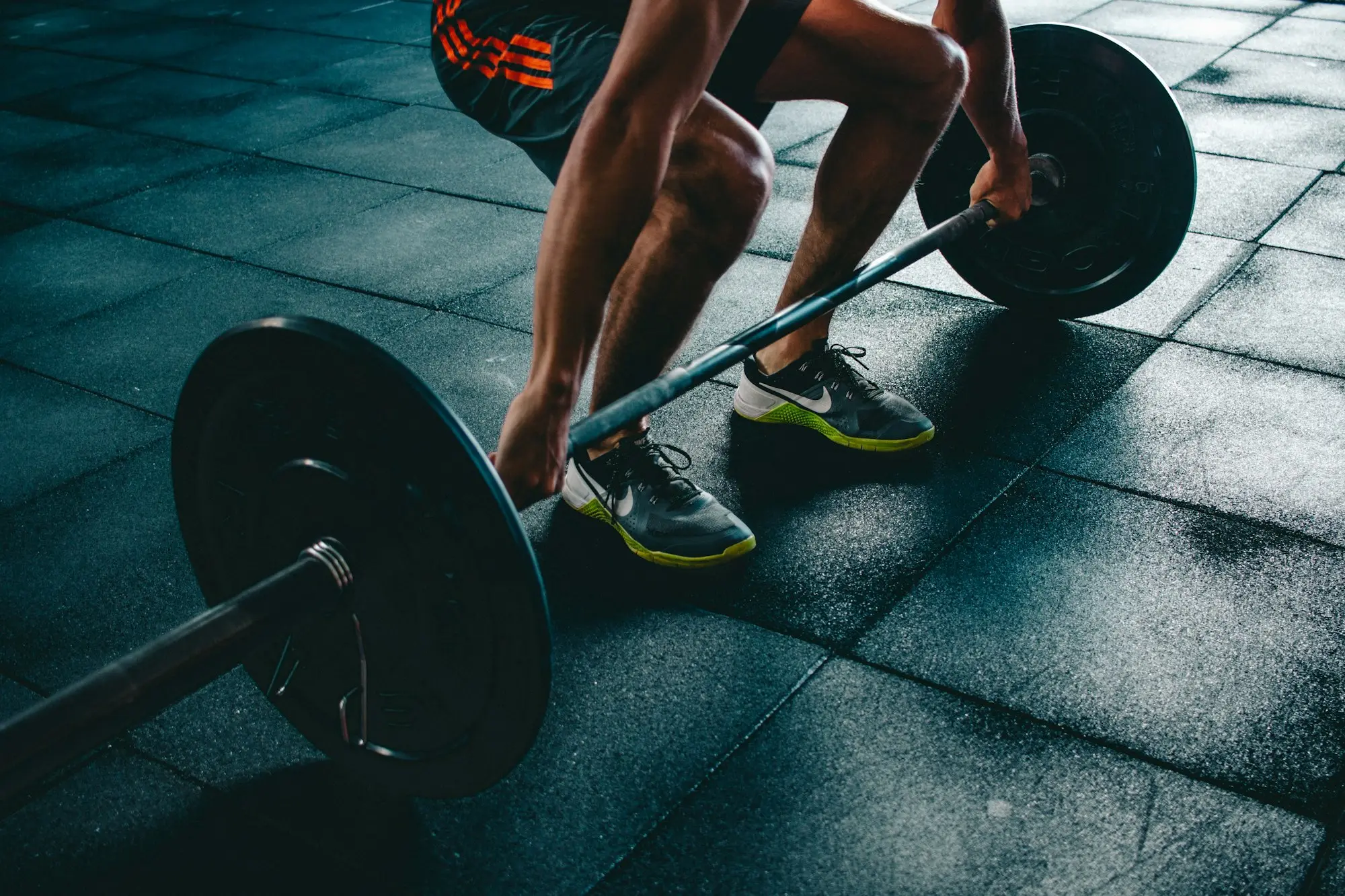 Gym owner weights floor in an Australian small business setting